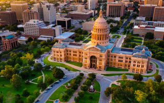 An aerial view image of the Texas state capitol.