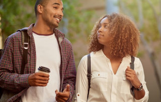 An image of a couple of students walking to class.